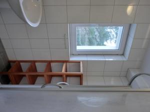 Ένα μπάνιο στο Ferienwohnung NH10