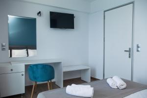 Postel nebo postele na pokoji v ubytování Sunrise Luxury Apartments Rhodes + 27 fotografií