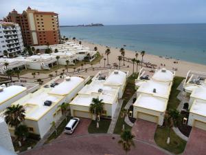 an aerial view of the beach and buildings at Spectacular 2 Bedroom Condo on Sandy Beach at Las Palmas Resort G-703 condo in Puerto Peñasco