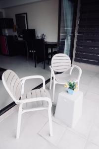 Posezení v ubytování Ratana Residence Thalang