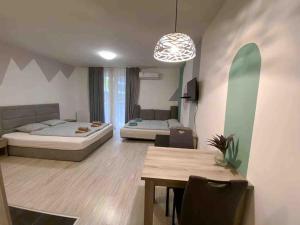 A bed or beds in a room at Corvin cozy and peaceful Apartment 313