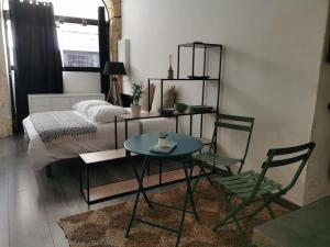 Posteľ alebo postele v izbe v ubytovaní La Boutique Studio centre ville
