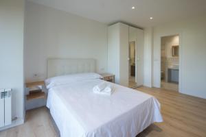 Posteľ alebo postele v izbe v ubytovaní Pucela apartmets