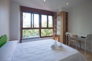 Posteľ alebo postele v izbe v ubytovaní Pucela apartmets
