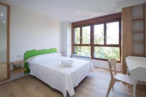 Posteľ alebo postele v izbe v ubytovaní Pucela apartmets