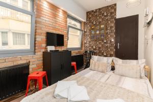 Posteľ alebo postele v izbe v ubytovaní Cheerful studio Budapest downtown