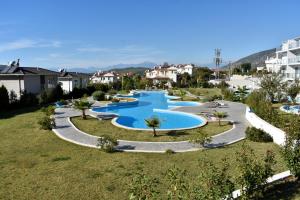 an image of a swimming pool at a resort at Memories Signature Apartment in Cedit