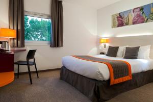 Postel nebo postele na pokoji v ubytování Best Western Colmar Expo