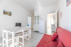 TV a/nebo společenská místnost v ubytování Residence Caletta