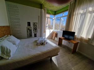 Postel nebo postele na pokoji v ubytování La Posada de El Chaflán