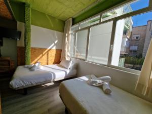 Postel nebo postele na pokoji v ubytování La Posada de El Chaflán
