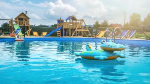 Bazén v ubytovaní Resorts G Białka Tatrzańska z sauną, Sun & Snow alebo v jeho blízkosti