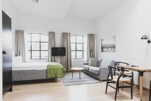 Ліжко або ліжка в номері The More Hotel Lund