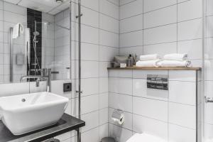 Ванна кімната в The More Hotel Lund