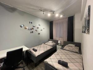 Postel nebo postele na pokoji v ubytování Apartament Gospodarcza
