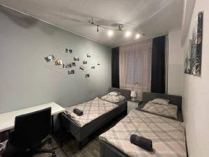 Posteľ alebo postele v izbe v ubytovaní Apartament Gospodarcza