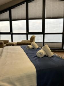 Postel nebo postele na pokoji v ubytování Taşliman Otel