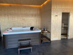 Posteľ alebo postele v izbe v ubytovaní Forest House Augustów