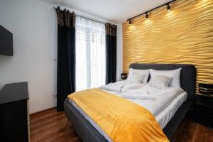 Posteľ alebo postele v izbe v ubytovaní Resorts G Białka Tatrzańska z sauną, Sun & Snow