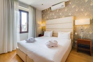 Cama o camas de una habitación en Oca Vitoria Village