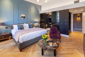 Una cama o camas en una habitación de Migliori Collection Piazza Navona