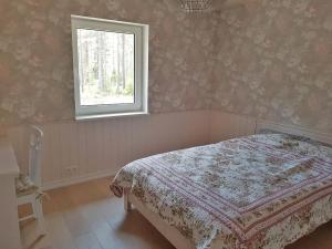 Postel nebo postele na pokoji v ubytování Puraviku puhkemaja