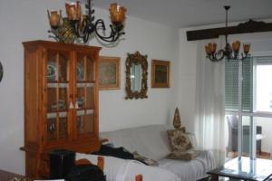 A bed or beds in a room at Piso lujo el toyo