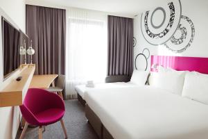Posteľ alebo postele v izbe v ubytovaní Holiday Inn - Warsaw City Centre by IHG