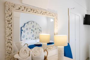 Cama ou camas em um quarto em Villa Dalu