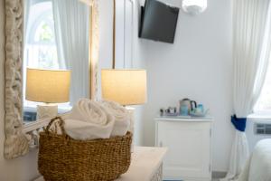 Cama ou camas em um quarto em Villa Dalu