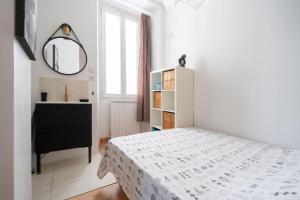 Posteľ alebo postele v izbe v ubytovaní L’élégant lumineux Ancien Couvent