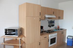 Küche/Küchenzeile in der Unterkunft Ferienappartement K118 in Strandnähe