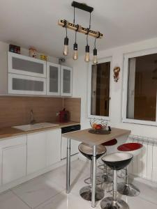 Kuchyň nebo kuchyňský kout v ubytování Apppartement Cosy 72m2