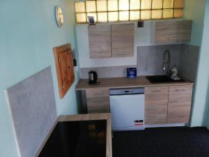 Kuchyň nebo kuchyňský kout v ubytování Apartmán Saxán Smržovka