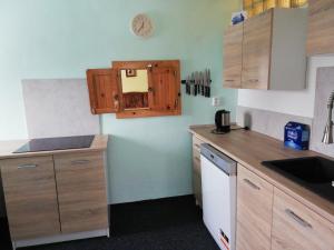 Kuchyň nebo kuchyňský kout v ubytování Apartmán Saxán Smržovka