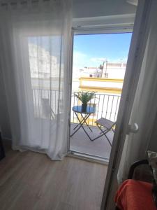 Balkon lub taras w obiekcie Cerca de todo piscina terraza wifi
