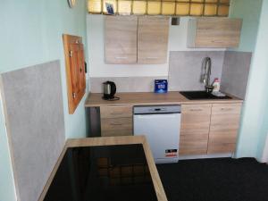 Kuchyň nebo kuchyňský kout v ubytování Apartmán Saxán Smržovka