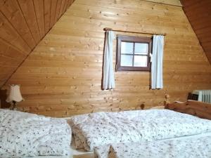 Llit o llits en una habitació de Ferienhaus Suda