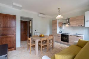 Kuchyň nebo kuchyňský kout v ubytování Pulciano Apartments
