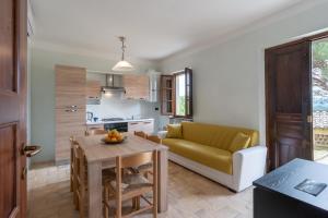 Kuchyň nebo kuchyňský kout v ubytování Pulciano Apartments
