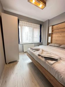 Postel nebo postele na pokoji v ubytování beydağı suit