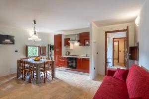 Kuchyň nebo kuchyňský kout v ubytování Pulciano Apartments