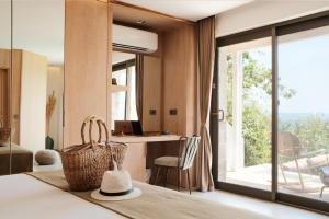Кровать или кровати в номере Villa Hotel Tamara