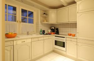 Η κουζίνα ή μικρή κουζίνα στο Strandhafer