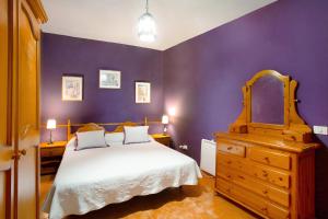 A bed or beds in a room at Finca Tropical