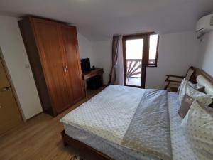 Postel nebo postele na pokoji v ubytování Casa Lac de Verde