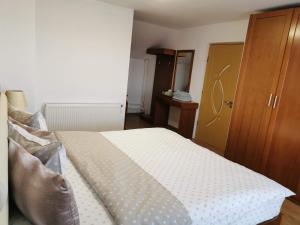 Postel nebo postele na pokoji v ubytování Casa Lac de Verde