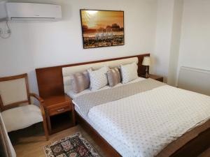 Postel nebo postele na pokoji v ubytování Casa Lac de Verde