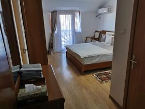 Postel nebo postele na pokoji v ubytování Casa Lac de Verde