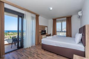 Voodi või voodid majutusasutuse Hotel Pharos toas